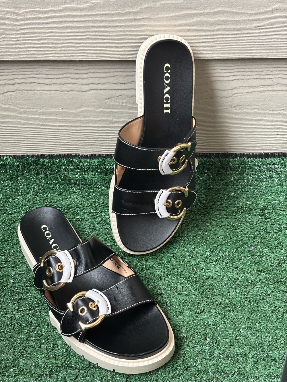 Coach Black Leather Double-Buckle Slide Mules with White Trim